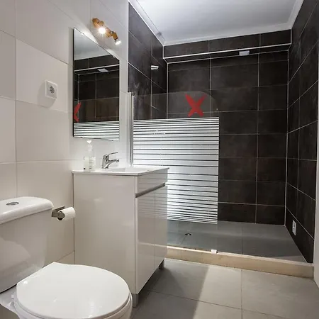 Alex Surf אכסניה